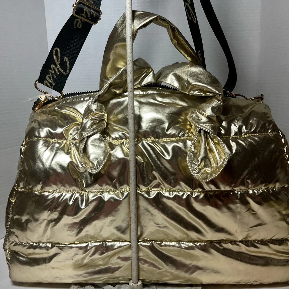 Justice Gold, metallic duffel bag